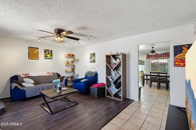 207 E Strahan Dr, Tempe, AZ 85283 - living area featuring ceiling fan, light wood finished floors, and rail lighting