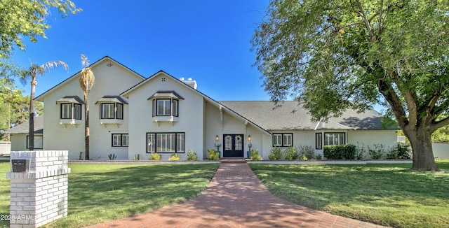 1712 E Fairfield St, Mesa, AZ 85203 - view of front of home with french doors, a front lawn, and a chimney
