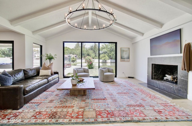 1712 E Fairfield St, Mesa, AZ 85203 - living room featuring a chandelier, a fireplace with flush hearth, beam ceiling, and high vaulted ceiling