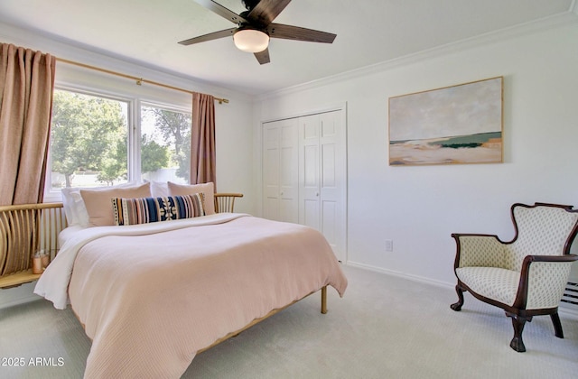 1712 E Fairfield St, Mesa, AZ 85203 - bedroom with a closet, ornamental molding, light carpet, and a ceiling fan