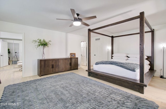 1712 E Fairfield St, Mesa, AZ 85203 - bedroom with light wood finished floors and ceiling fan