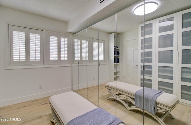 1712 E Fairfield St, Mesa, AZ 85203 - bedroom with baseboards and wood finished floors