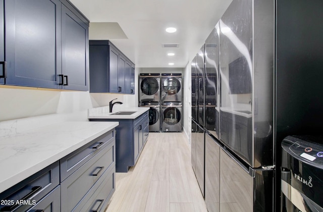 1712 E Fairfield St, Mesa, AZ 85203 - laundry room with stacked washer / drying machine and recessed lighting
