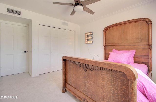 1712 E Fairfield St, Mesa, AZ 85203 - bedroom featuring a closet, light colored carpet, ceiling fan, and ornamental molding