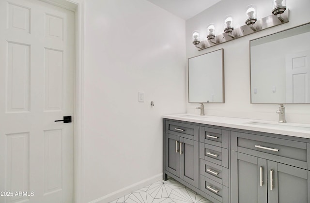 1712 E Fairfield St, Mesa, AZ 85203 - full bathroom with double vanity and baseboards