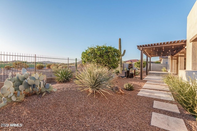 view of yard with a pergola