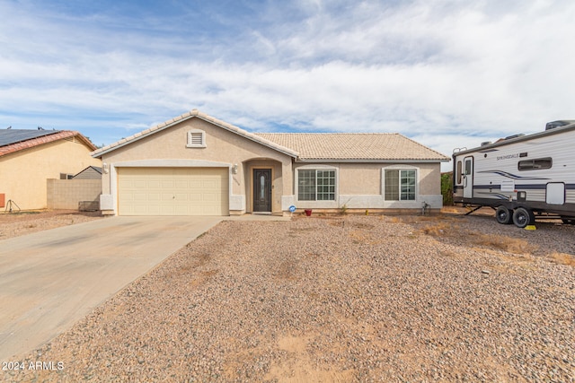 ranch-style house with a garage