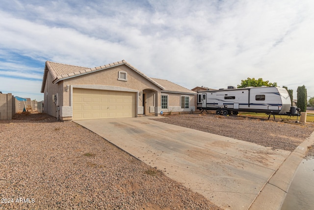 single story home with a garage