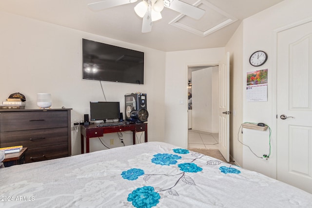 tiled bedroom with ceiling fan