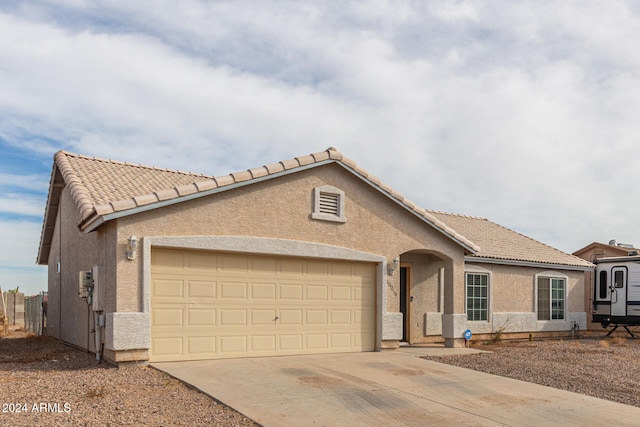 view of front of home featuring a garage