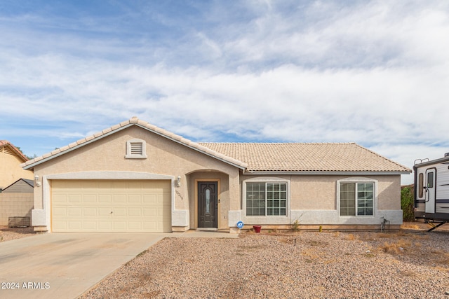 view of front of home with a garage