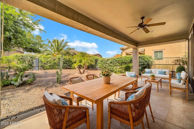 view of patio / terrace with outdoor lounge area, outdoor dining area, and a ceiling fan