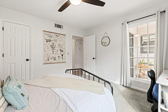 bedroom with ceiling fan and carpet floors