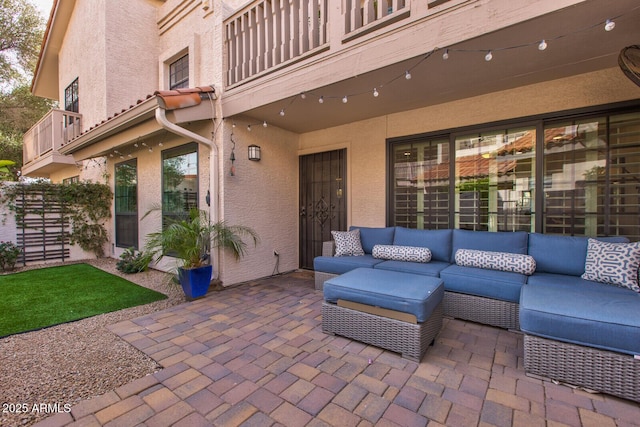 view of patio / terrace featuring outdoor lounge area and a balcony