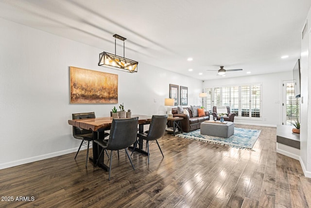 dining room featuring ceiling fan and dark hardwood / wood-style flooring