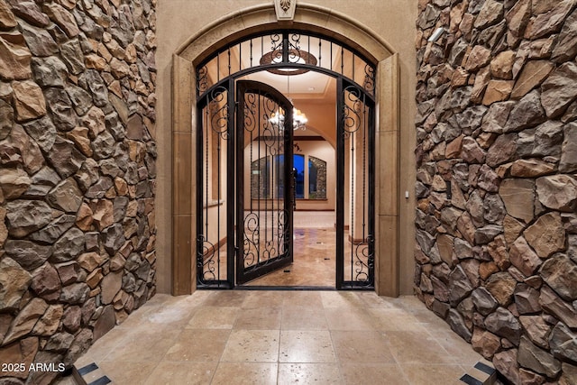 3523 E Presidio Cir, Mesa, AZ 85213 - doorway to property with a gate and stone siding