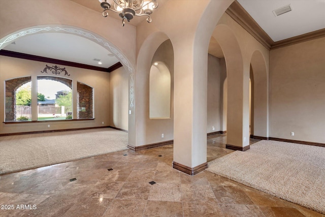 3523 E Presidio Cir, Mesa, AZ 85213 - entryway featuring baseboards, ornamental molding, a chandelier, and arched walkways