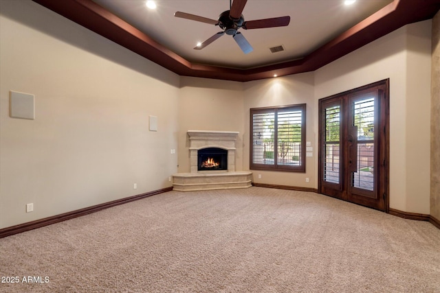 3523 E Presidio Cir, Mesa, AZ 85213 - unfurnished living room featuring carpet, a premium fireplace, baseboards, ceiling fan, and recessed lighting