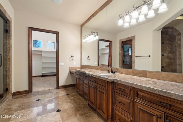 3523 E Presidio Cir, Mesa, AZ 85213 - full bath with vanity, a shower stall, baseboards, and a walk in closet
