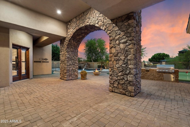 3523 E Presidio Cir, Mesa, AZ 85213 - patio terrace at dusk featuring a patio area and french doors