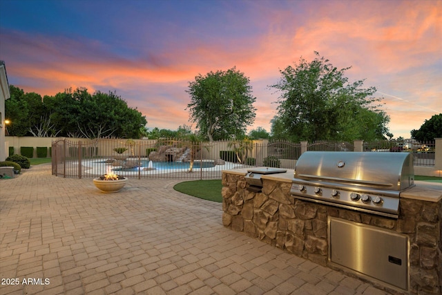 3523 E Presidio Cir, Mesa, AZ 85213 - patio terrace at dusk featuring a fenced backyard and a patio