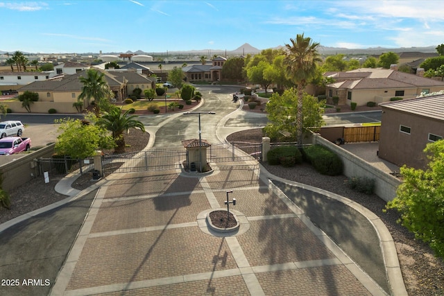 3523 E Presidio Cir, Mesa, AZ 85213 - view of home's community with a gate, a residential view, and a mountain view
