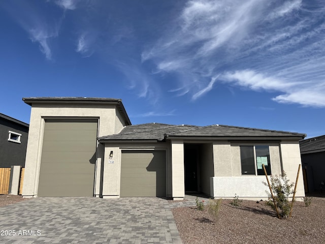 view of front of property with a garage