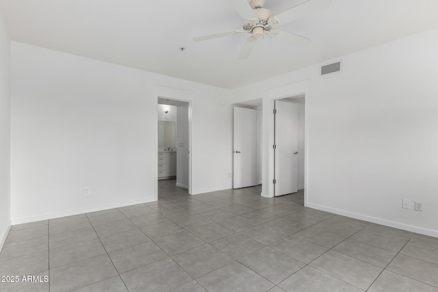 1111 W University Dr Unit 3016, Tempe, AZ 85281 - empty room with light tile patterned floors, a ceiling fan, baseboards, and a pendent fire sprinkler