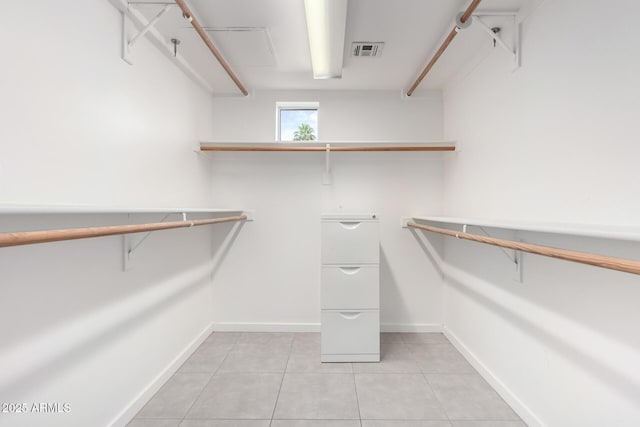 1111 W University Dr Unit 3016, Tempe, AZ 85281 - walk in closet with light tile patterned flooring