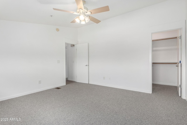 1111 W University Dr Unit 3016, Tempe, AZ 85281 - unfurnished bedroom featuring carpet, a spacious closet, ceiling fan, and baseboards