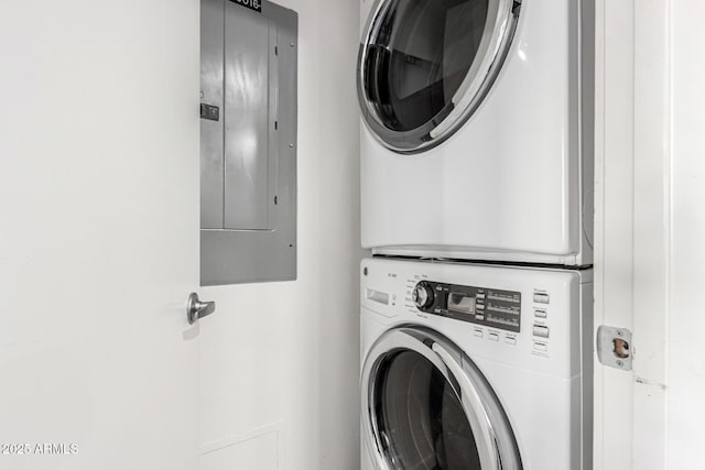 1111 W University Dr Unit 3016, Tempe, AZ 85281 - laundry room featuring electric panel and stacked washing machine and dryer