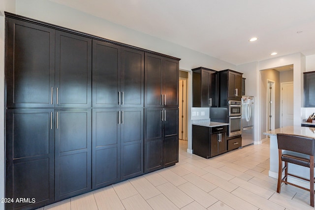 12035 W Roy Rogers Rd, Peoria, AZ 85383 - kitchen featuring appliances with stainless steel finishes