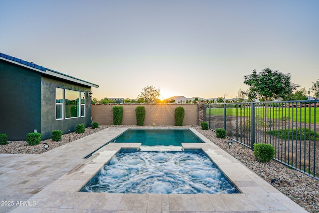 11534 N Jerome St, Surprise, AZ 85388 - view of pool featuring a fenced backyard and a pool with connected hot tub