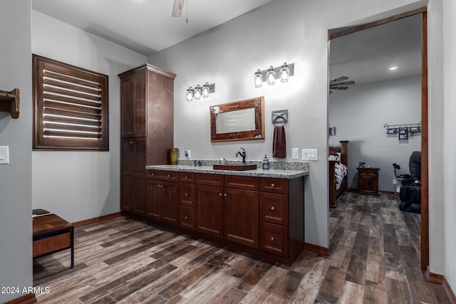 bathroom featuring vanity and hardwood / wood-style floors