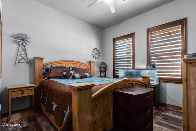 bedroom featuring ceiling fan and dark hardwood / wood-style flooring