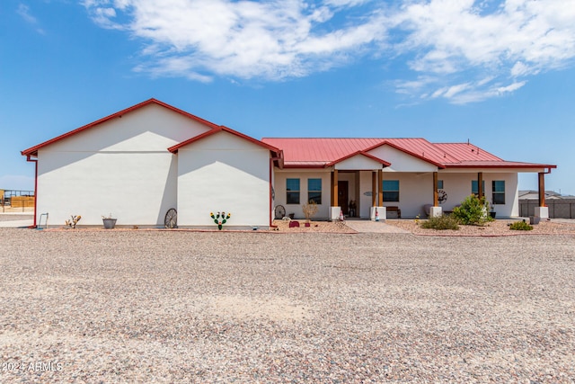 view of front of home featuring covered porch