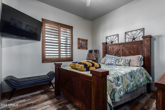 bedroom featuring dark hardwood / wood-style floors and ceiling fan