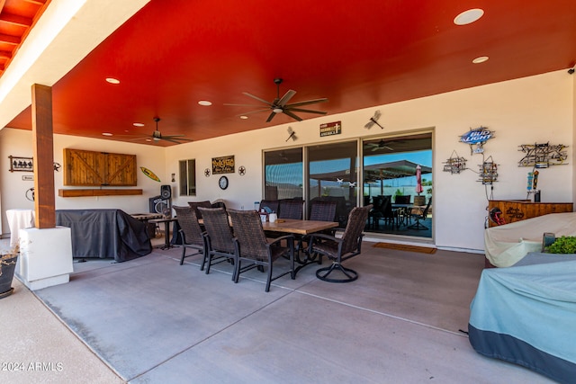 view of patio / terrace featuring ceiling fan