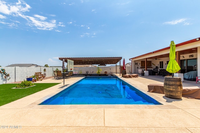 view of swimming pool featuring a patio area and a pergola