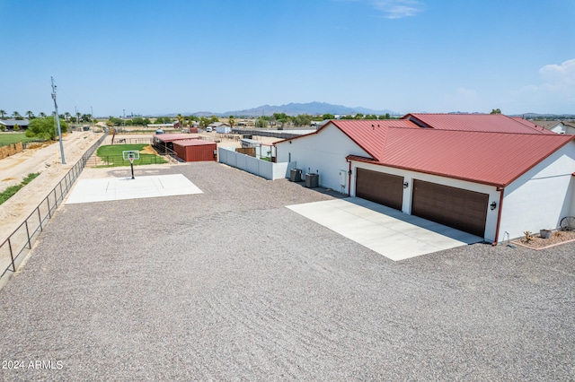 birds eye view of property with a mountain view