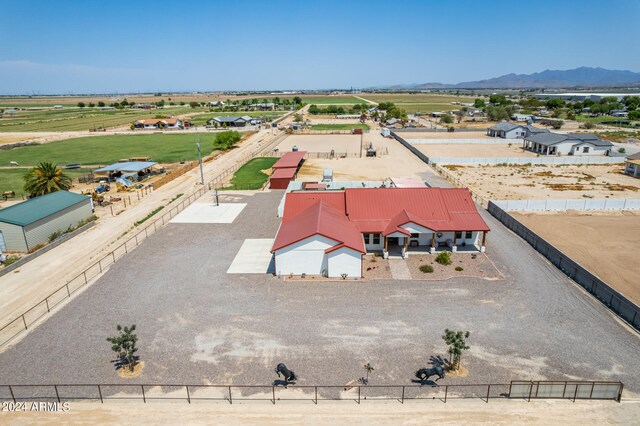 birds eye view of property featuring a mountain view