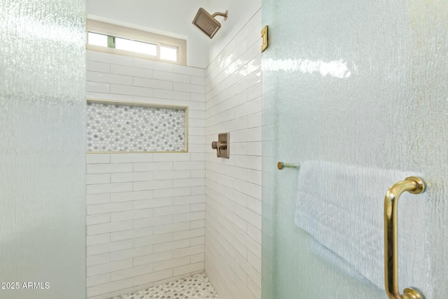 bathroom featuring a shower stall