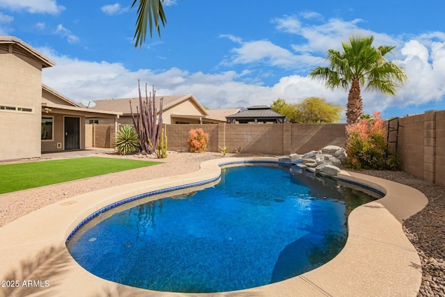 view of swimming pool with a fenced in pool, a patio area, and a fenced backyard