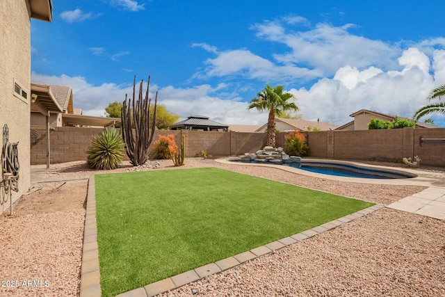 view of yard featuring a patio area, a fenced backyard, and a fenced in pool