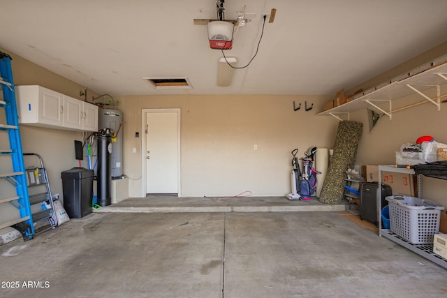 garage with a garage door opener and water heater