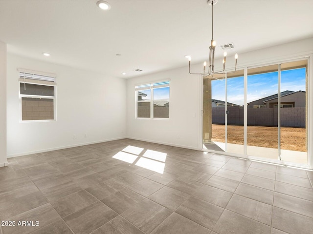 empty room with light tile patterned floors, baseboards, visible vents, a chandelier, and recessed lighting