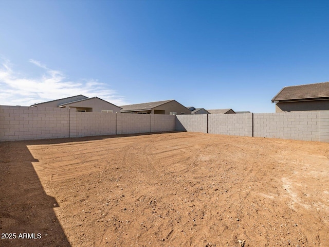 view of yard featuring a fenced backyard