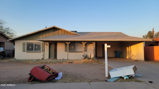 view of front of home featuring a carport