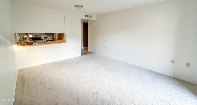 empty room with carpet floors