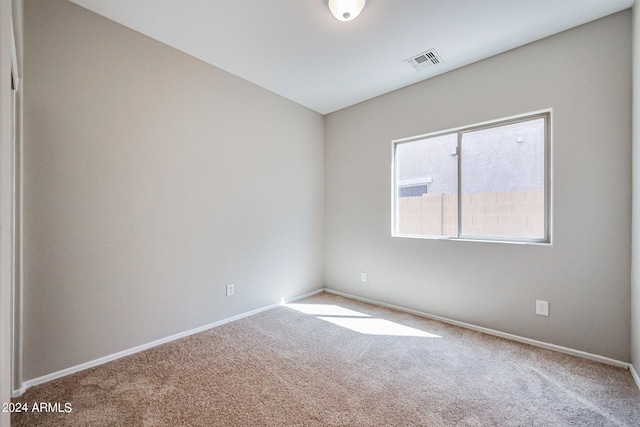 empty room featuring carpet flooring